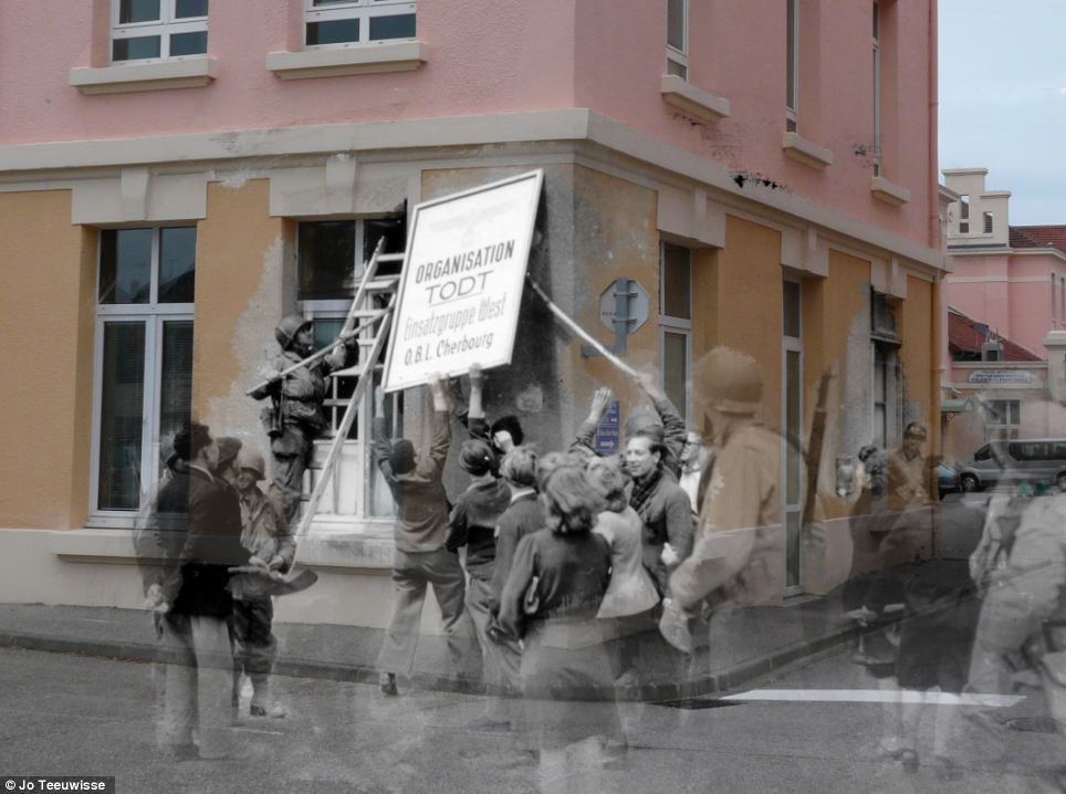 Historical colour: A sign reading Todt Organisation - a Third Reich civil and military engineering group in Germany - is pictured over a pretty orange and pink house