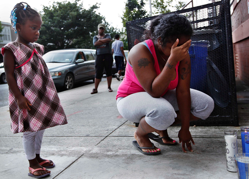 A woman grieving for her brother and cousin in Brooklyn, New York