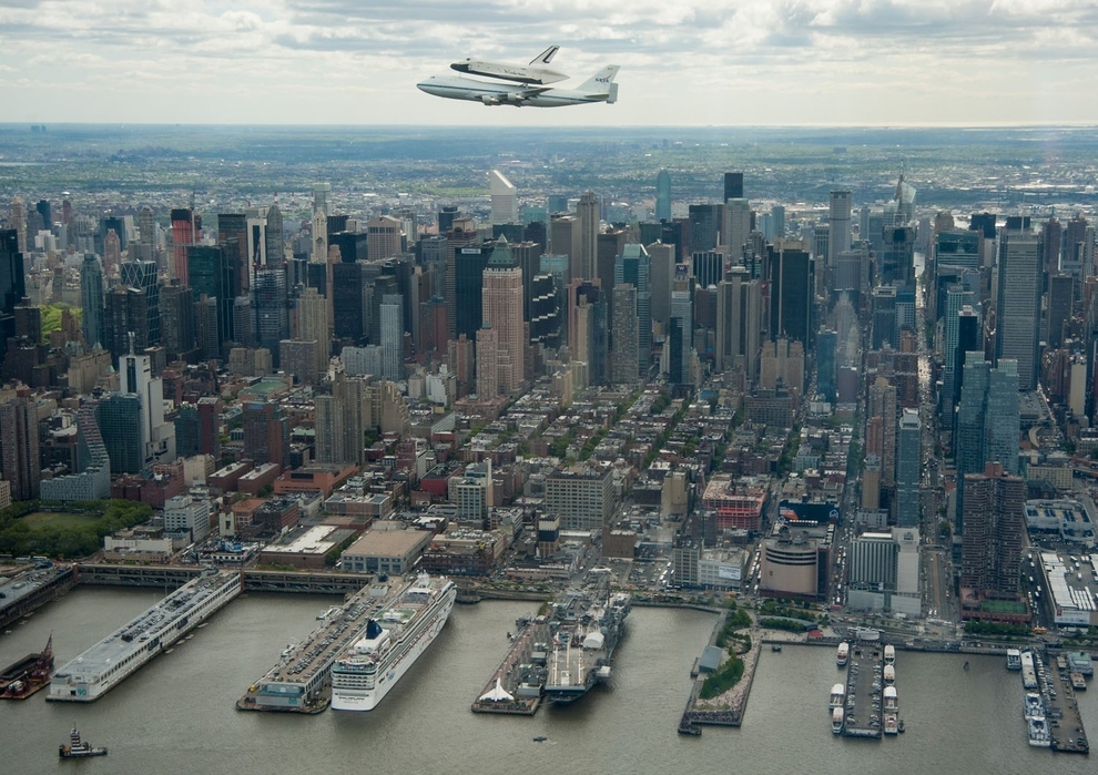 The Space Shuttle Enterprise flying above New York City