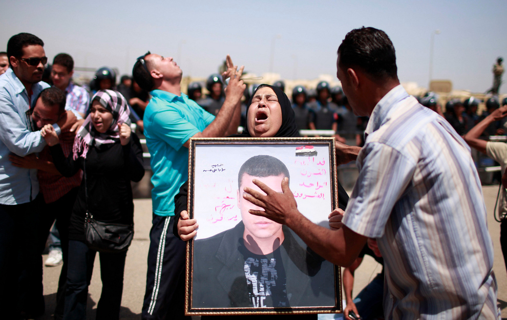 People who lost family members during the uprising in Egypt react to Hosni Mubarak&#39;s prison sentence