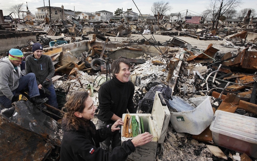 A couple discovering their family records survived Hurricane Sandy