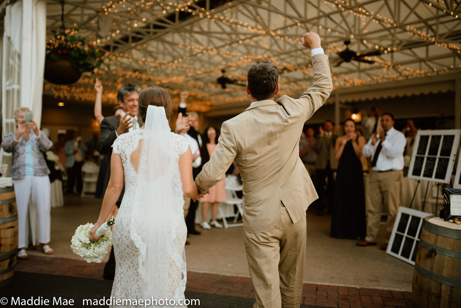 "I’ve never seen such a emotional 'grand entrance' as all 184 guests cheered when Johnny and Laura walked in, and showered them in a sea of passionate hugs," Wilbur said.